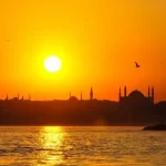 mosque-river-sun